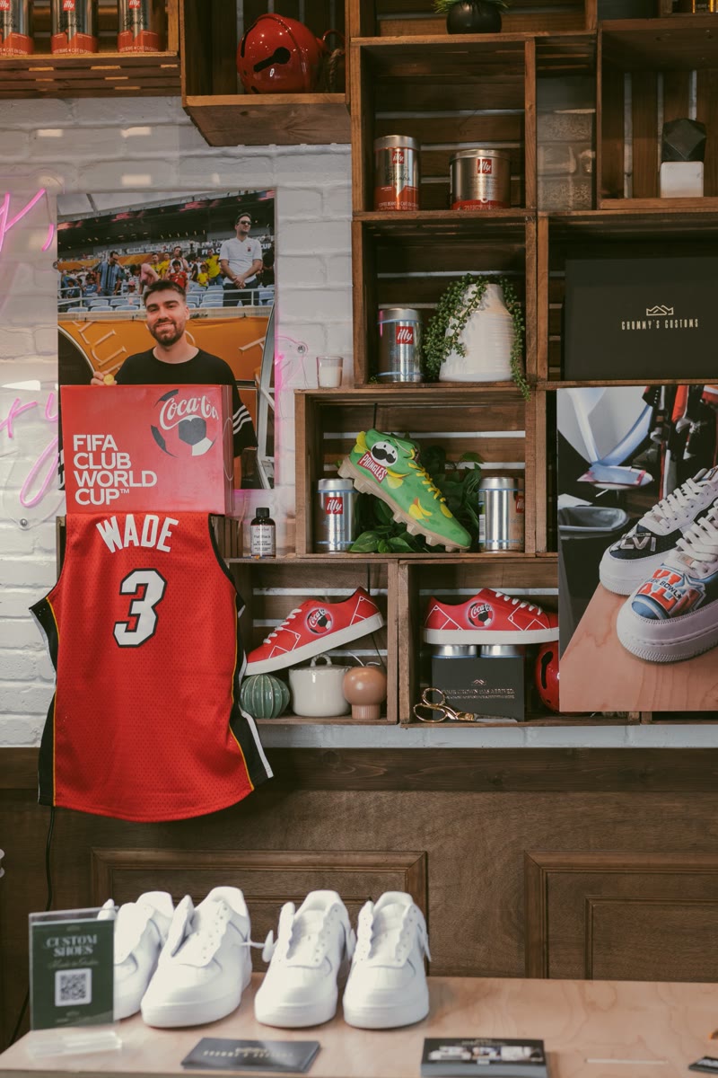 Chummy’s Customs sneaker bar and sports memorabilia wall