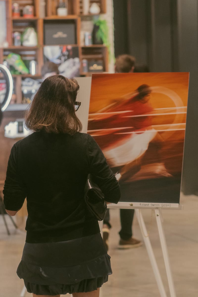 Guest viewing the sport photography exhibit